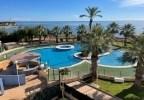 Property with private garden in Calas de Cabo Roig complex, first line of the sea, Aguamarina