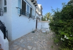 casa con jardín en planta baja en Cabo Roig junto a la playa de Cala Capitán